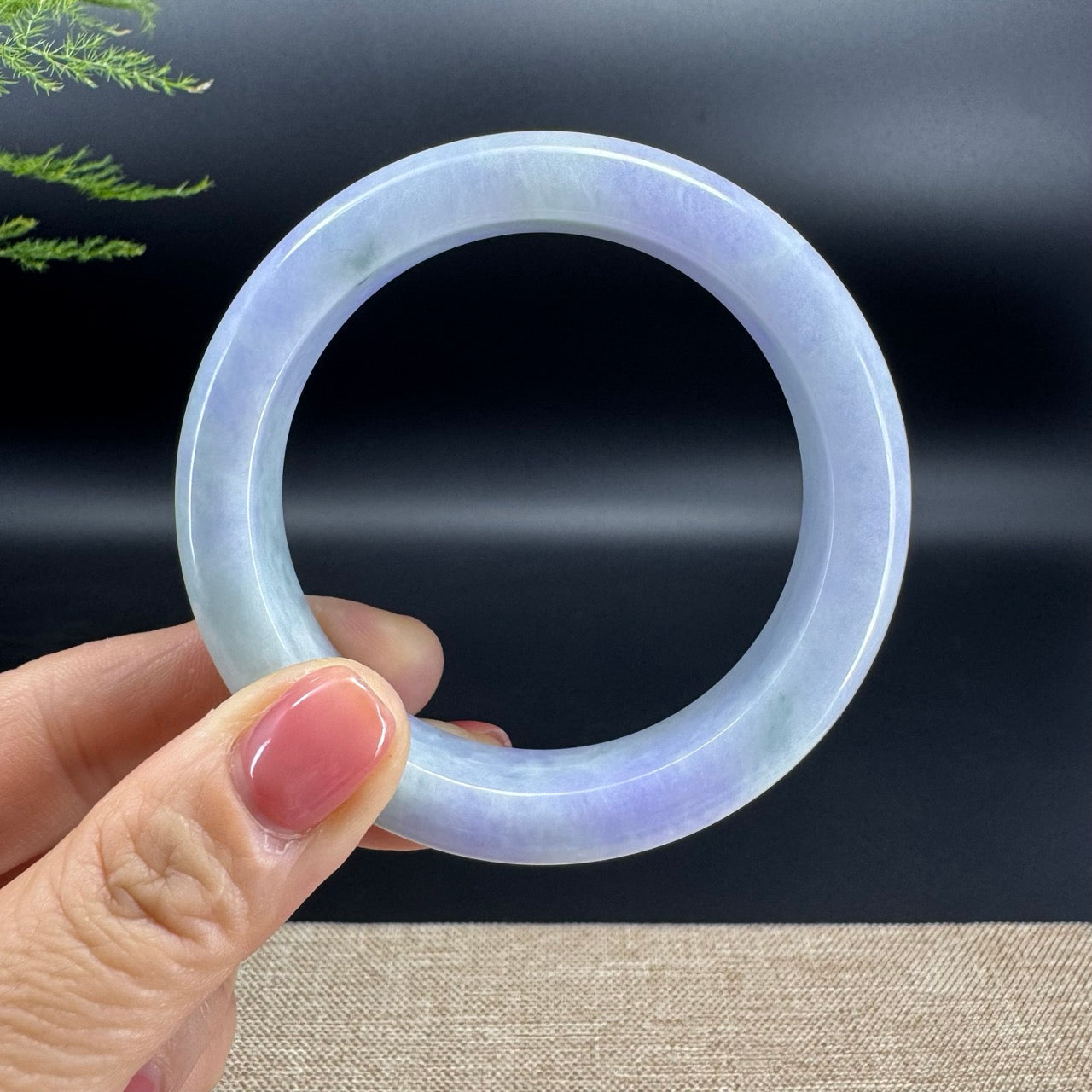 The bangle shape of the half round.The bangle color is lavender green.