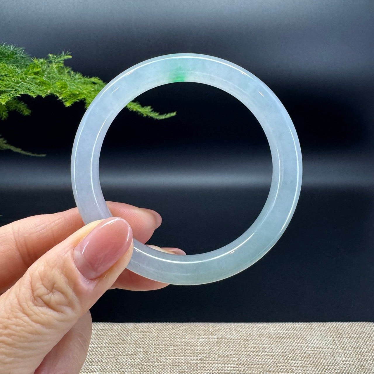 The shape of the bangle is traditional round.The bangle color is icy spicy green.