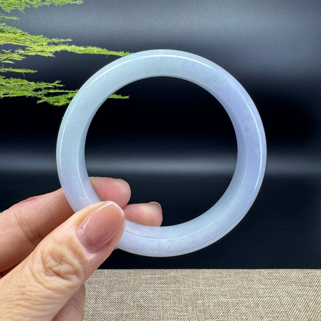 The bangle shape of the half round.The bangle color is icy lavender.