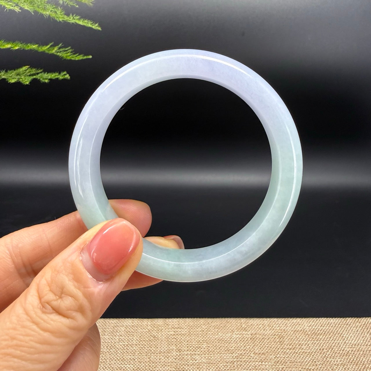The bangle shape of the half round.The bangle color is lavender green.