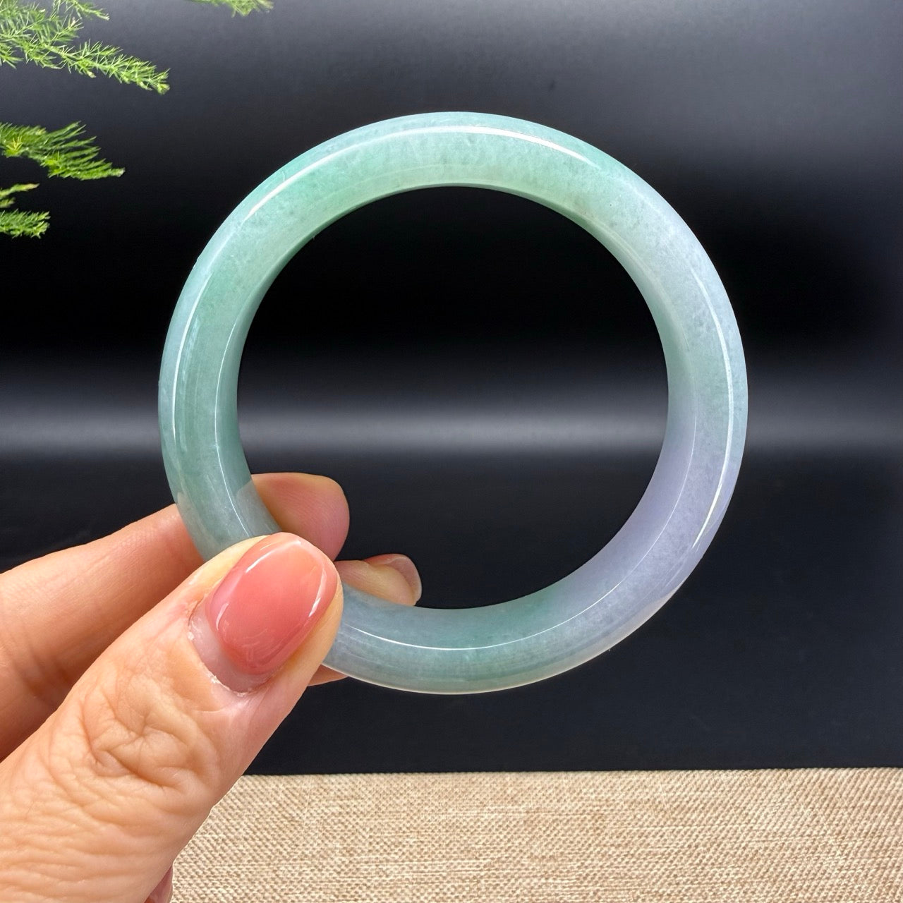 The bangle shape of the half round.The bangle color is lavender green,like blue berry.