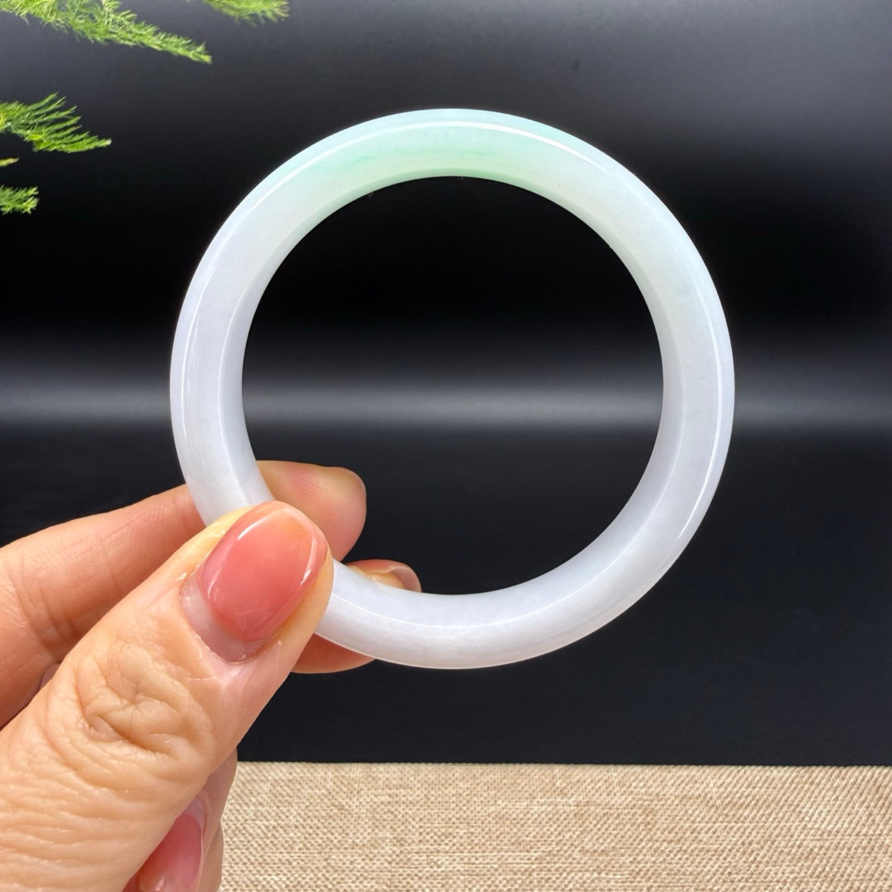 The bangle shape of the half round.The bangle color is lavender green.