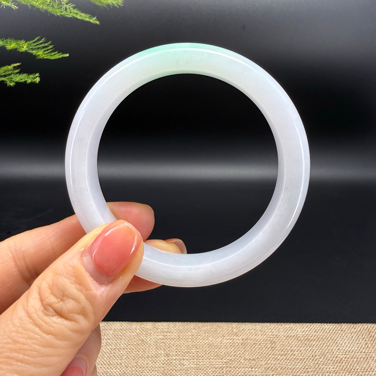 The bangle shape of the half round.The bangle color is lavender green