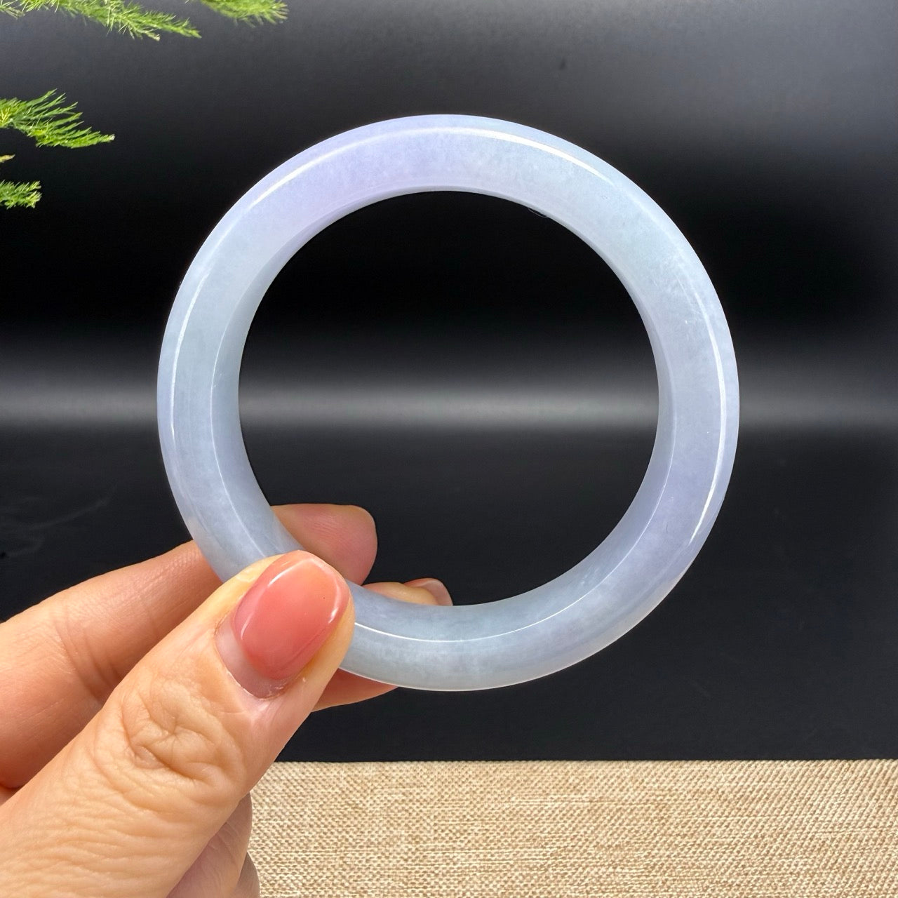 The bangle shape of the half round.The bangle color is lavender.