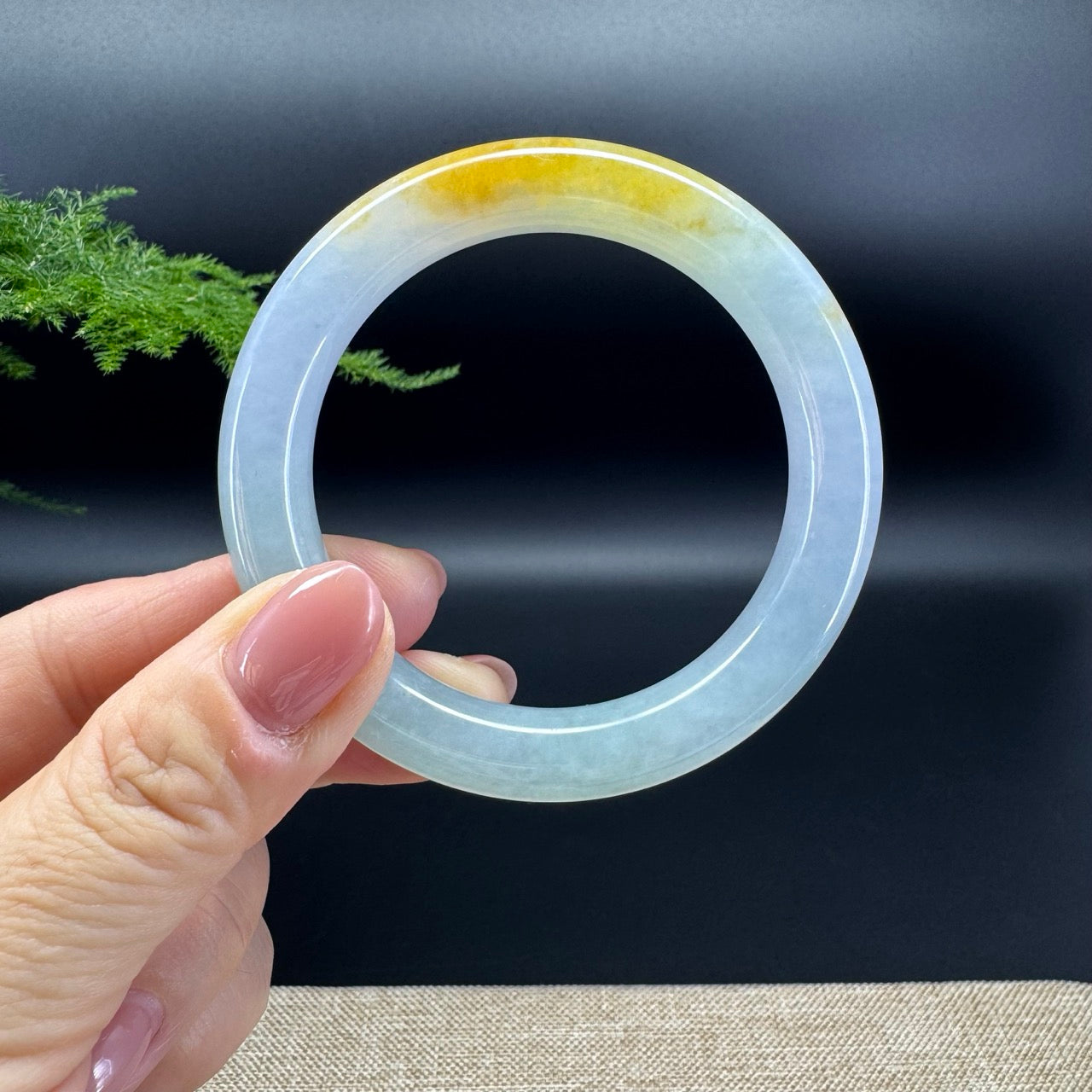 The bangle shape of the half round.The bangle color is icy yellow.
