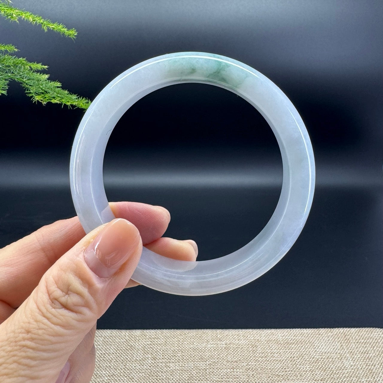 The bangle shape of the half round.The bangle color is lavender green.