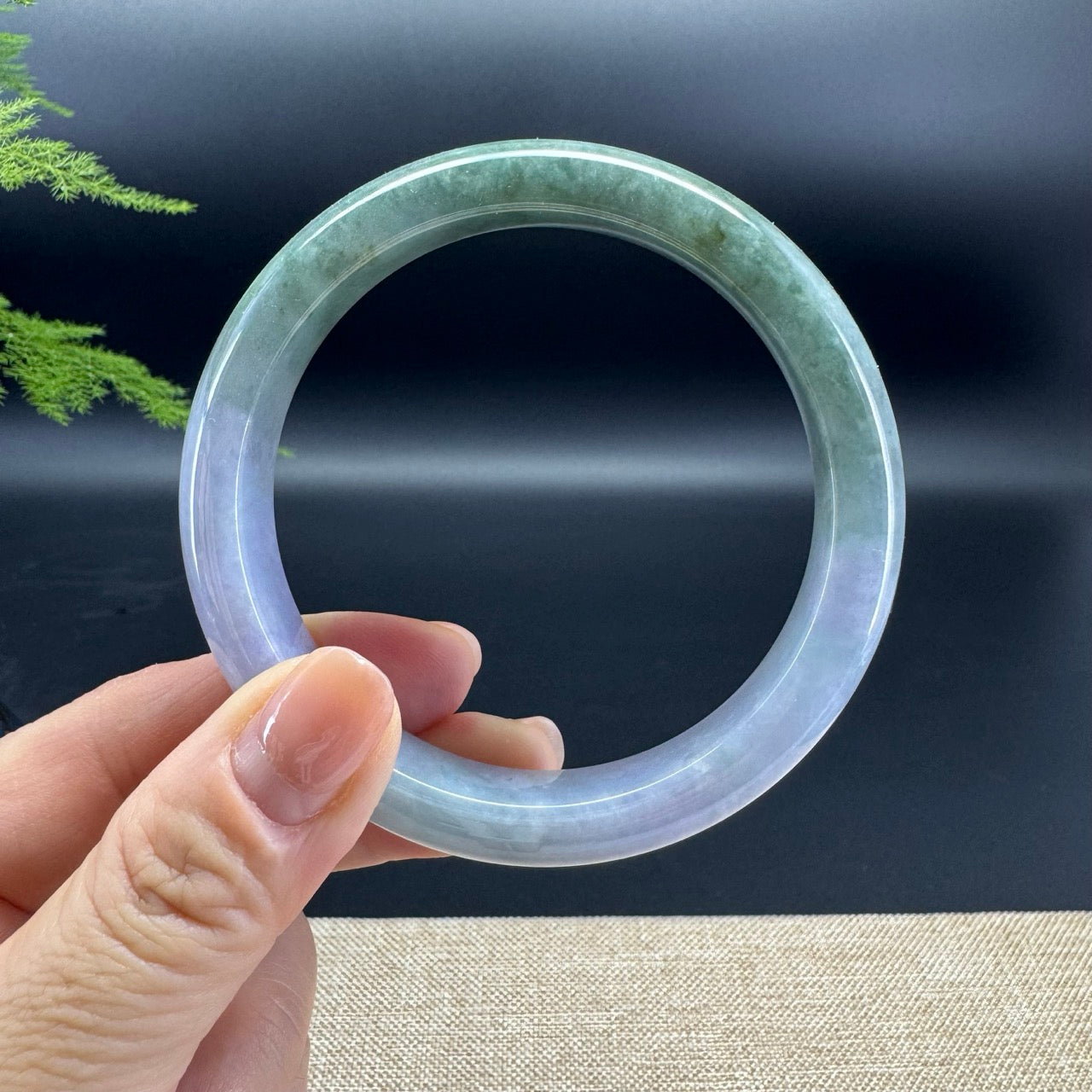 The bangle shape of the half round.The bangle colors are lavender green.
