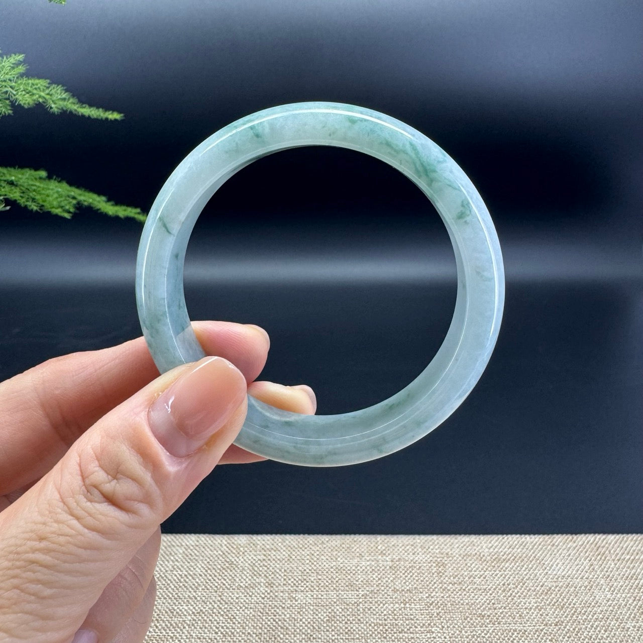 The bangle shape of the half round.The bangle color is icy blue flower.