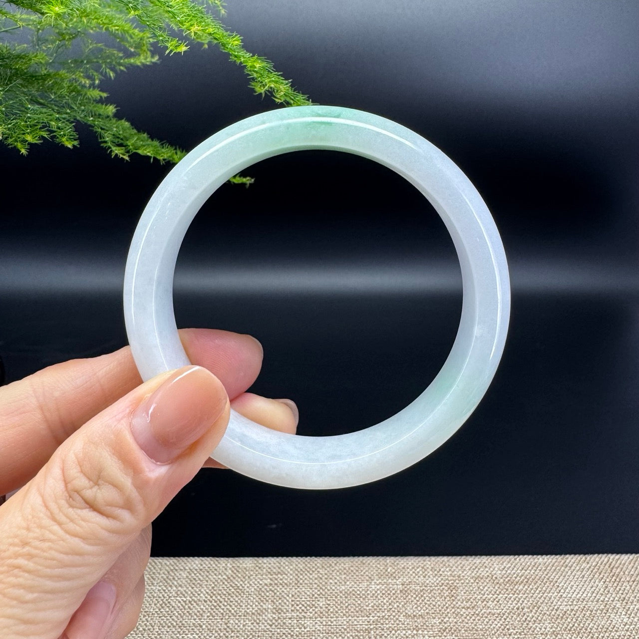 The bangle shape of the half round.The bangle color is lavender green.