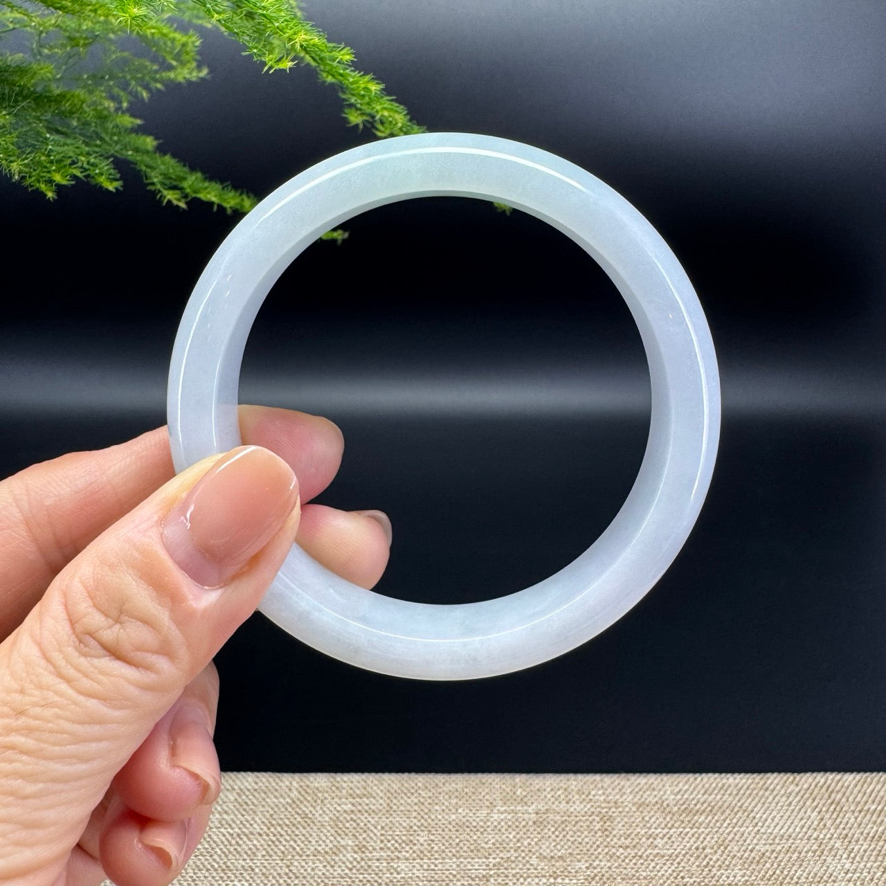 The bangle shape of the half round.The bangle color is lavender.