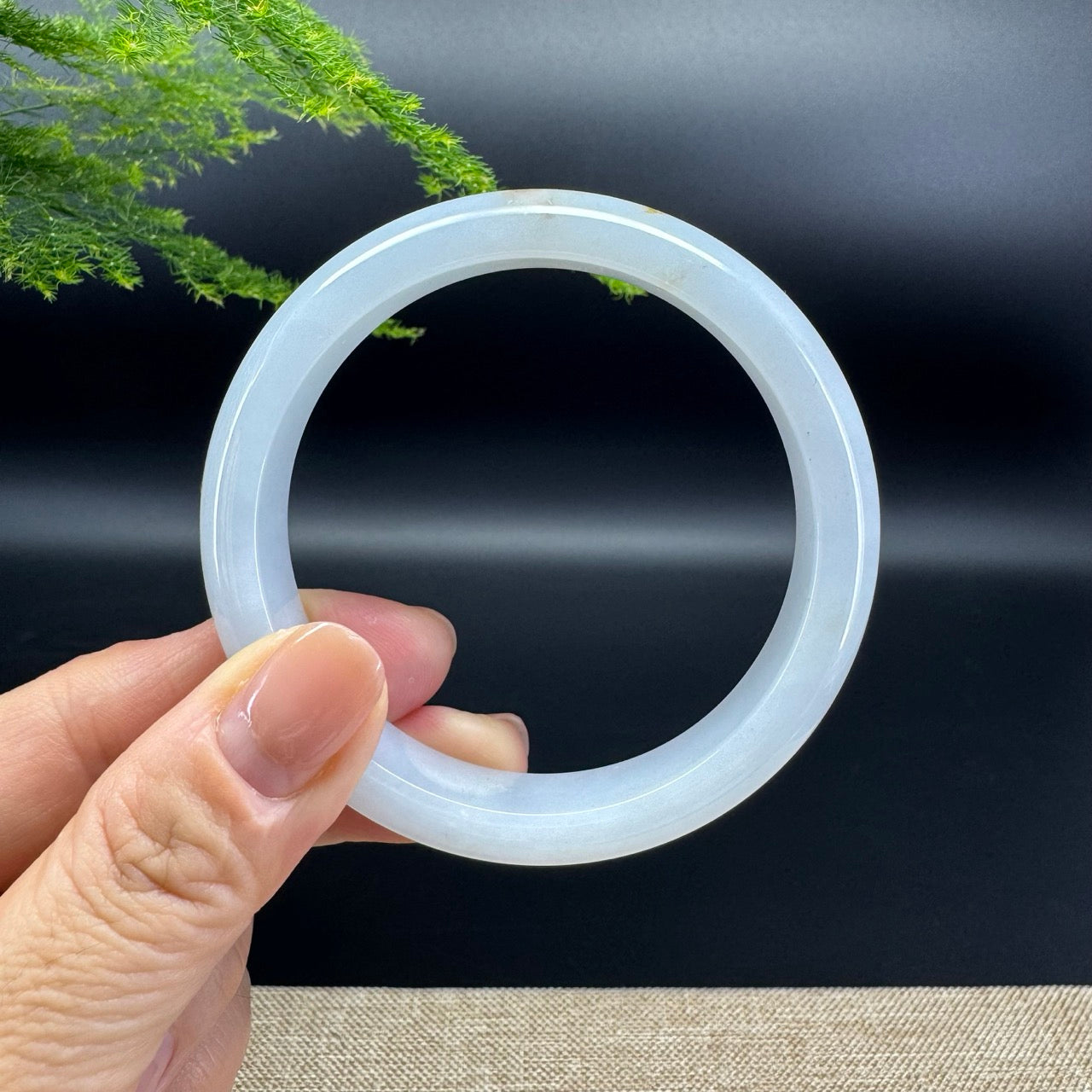 The bangle shape of the half round.The bangle color is  lavender.