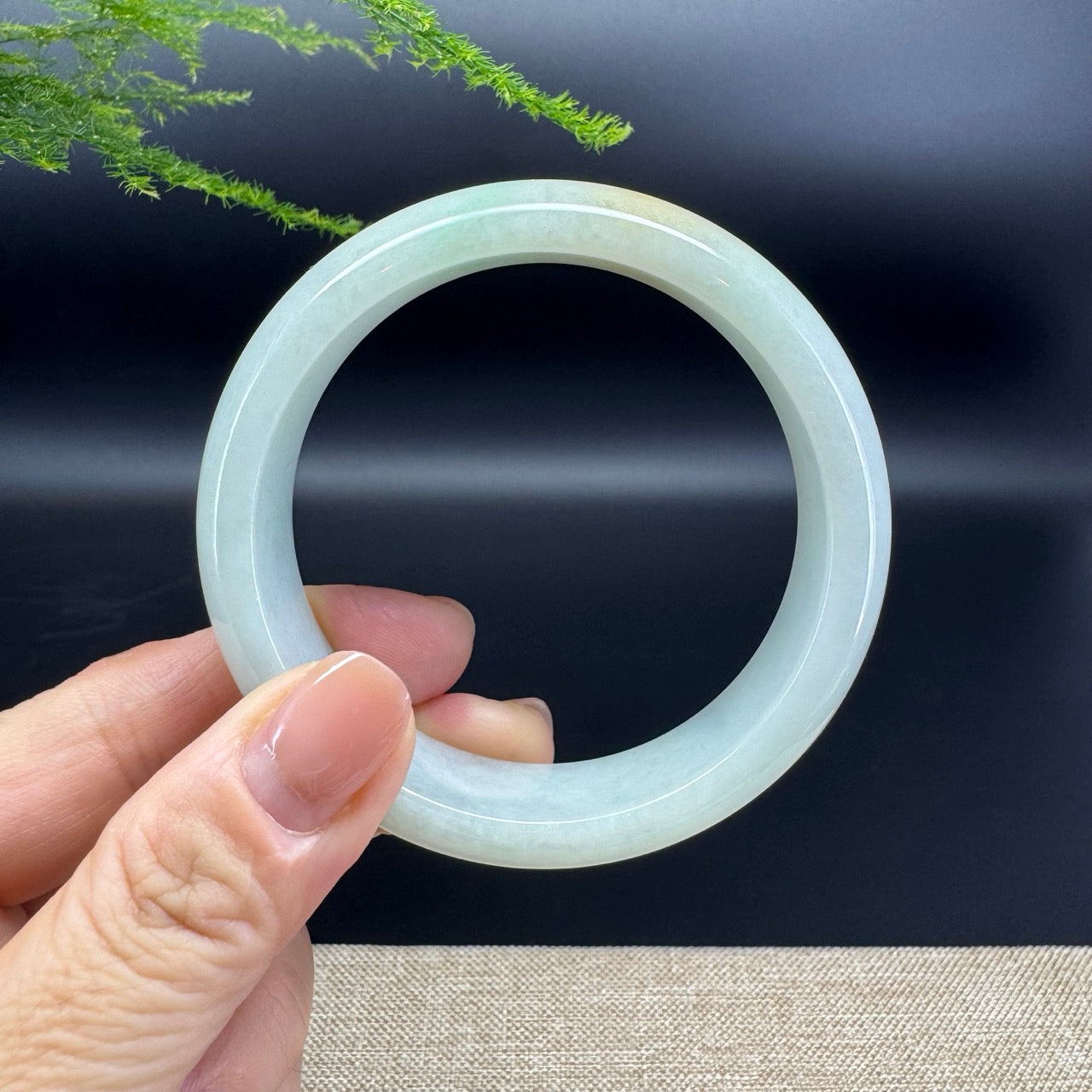 The bangle shape of the half round.The bangle color is yellow green.