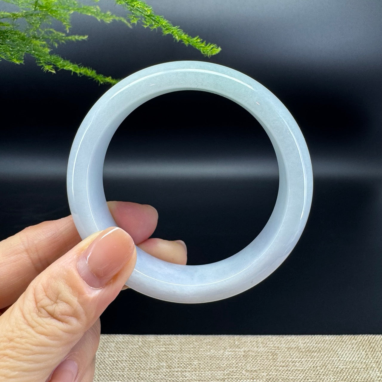 The bangle shape of the half round.The bangle color is lavender green.