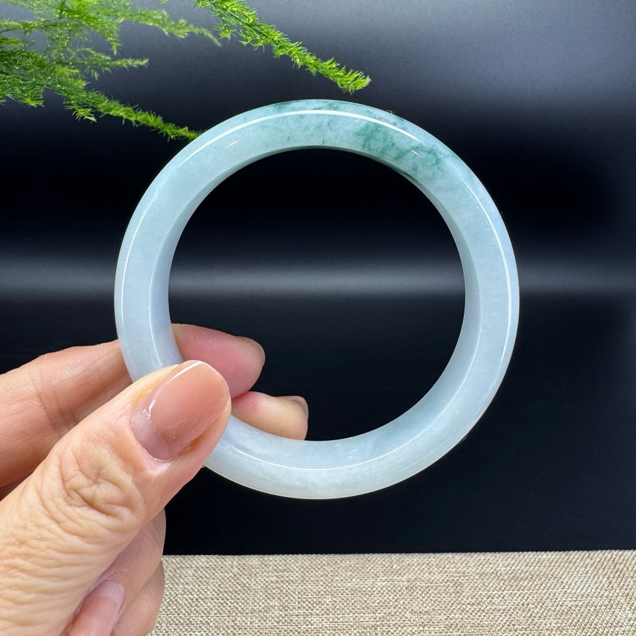 The bangle shape of the half round.The bangle color is oil green.