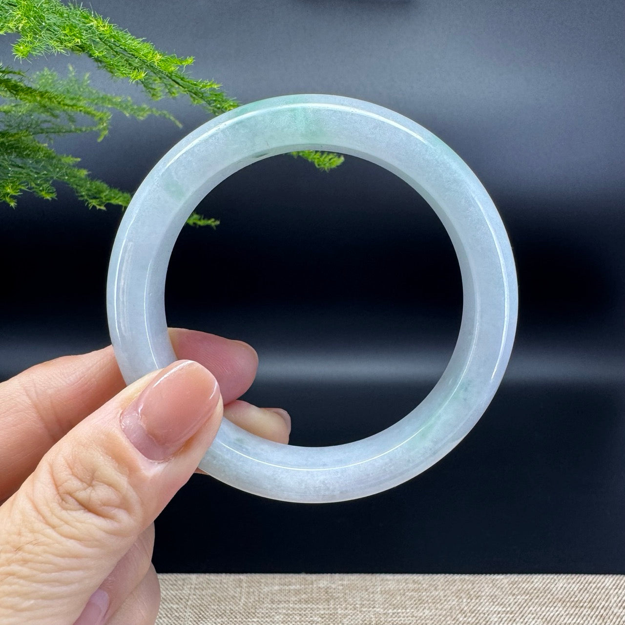 The bangle color is icy green.The bangle shape of the half round.