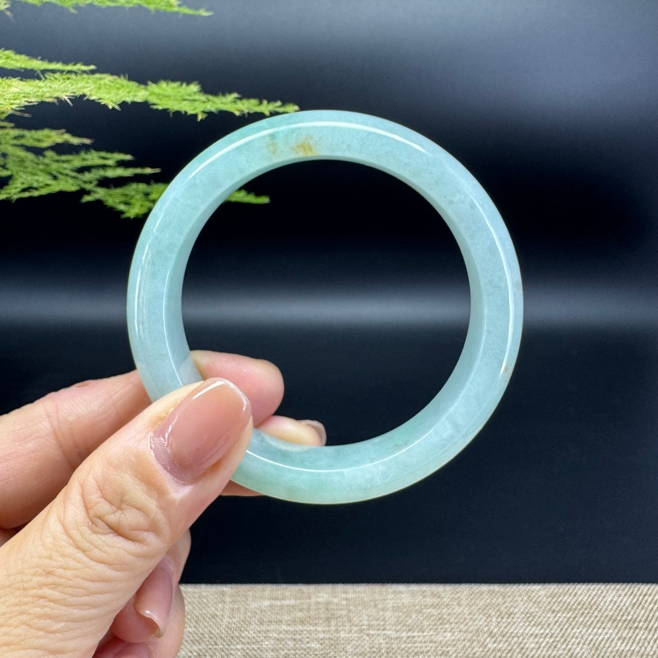 The bangle shape of the half round.The bangle color is apple green.