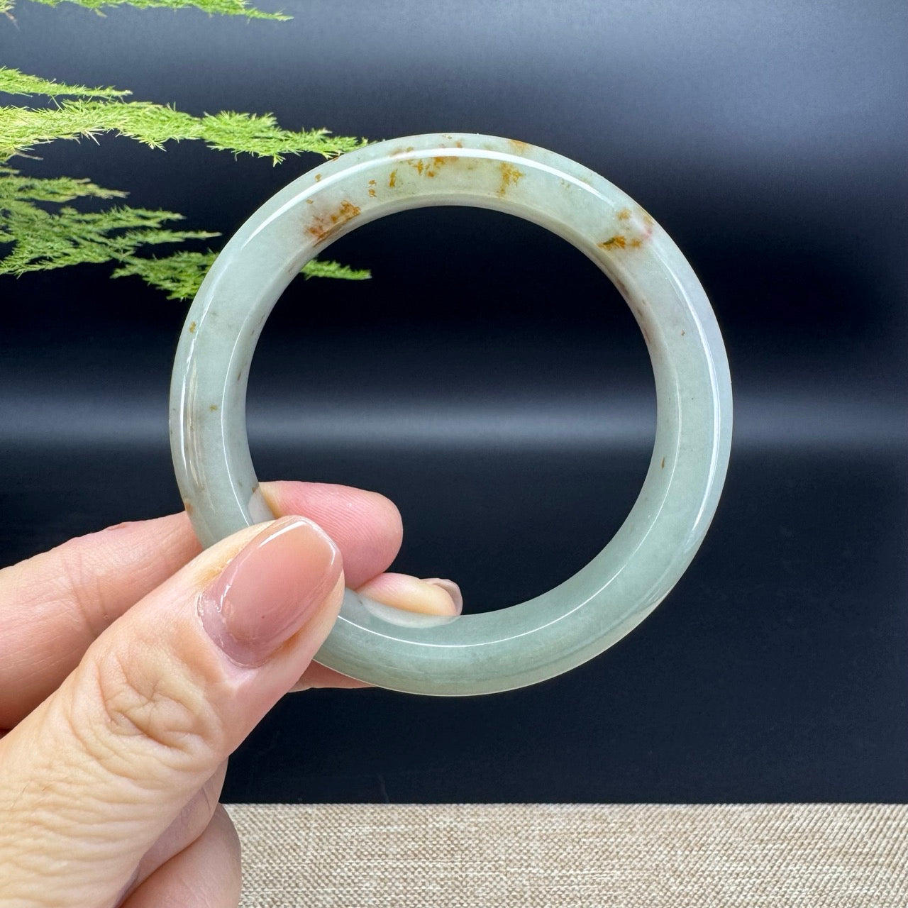 The bangle shape of the half round.The bangle color is yellow green.