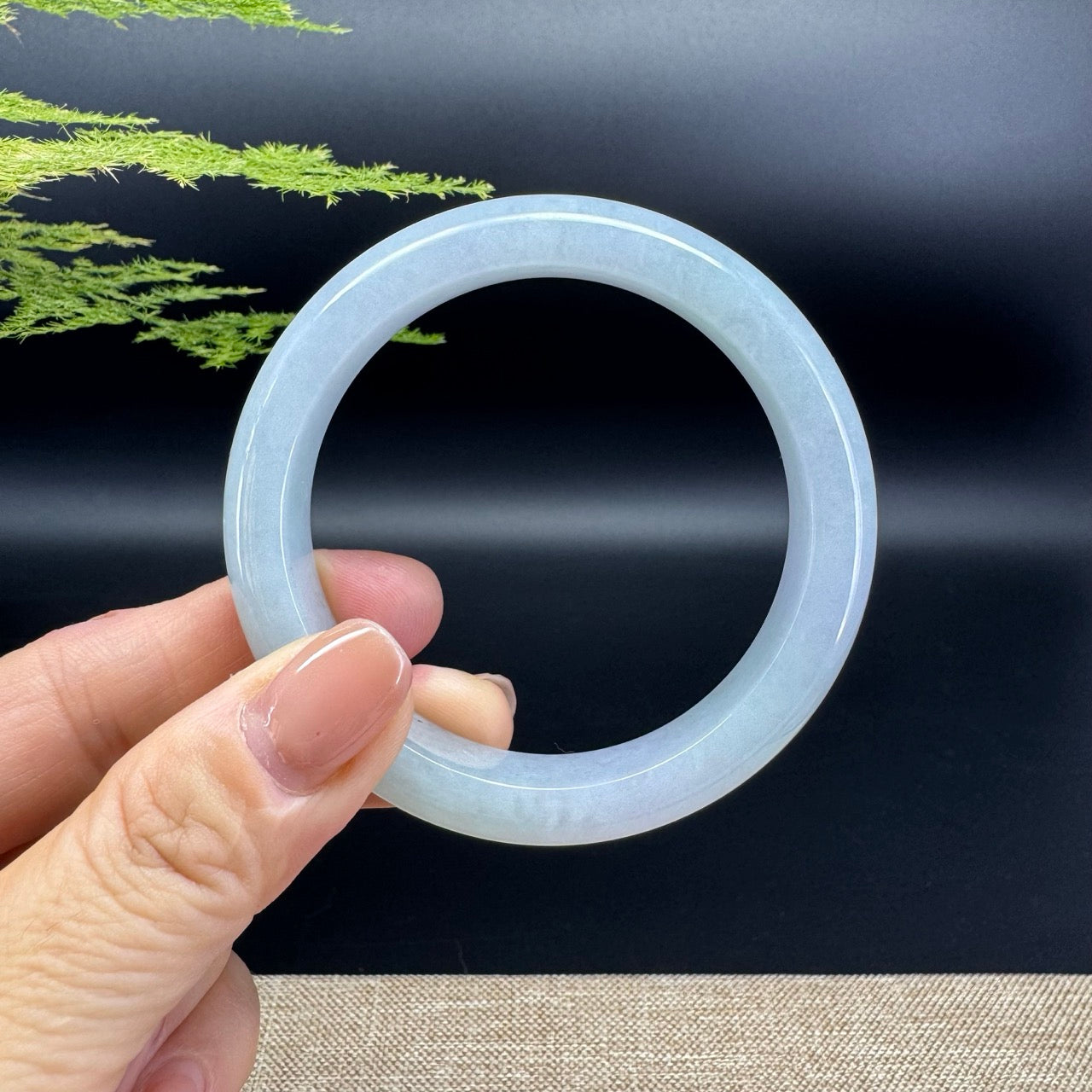The bangle shape of the half round.The bangle color is lavender green.