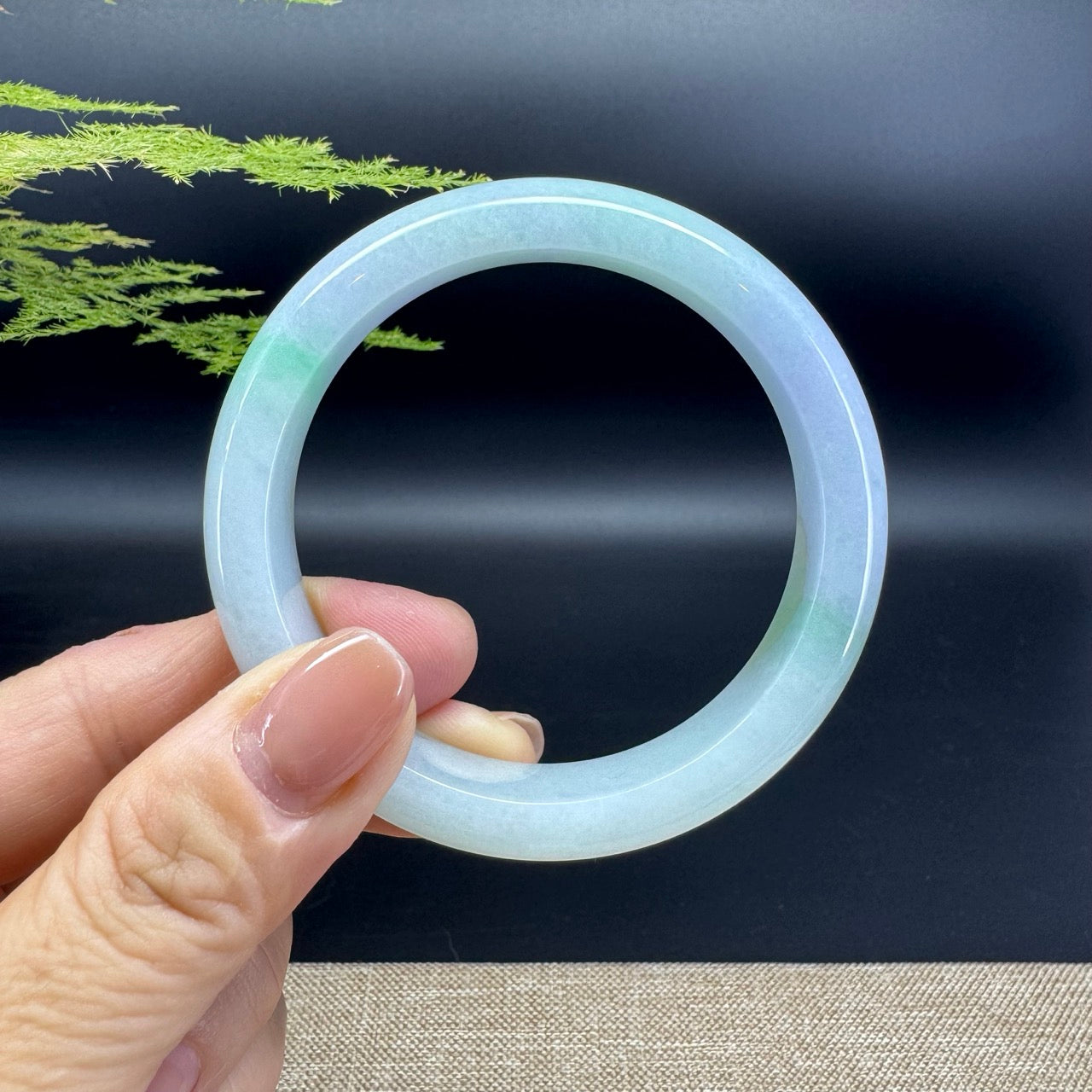 The bangle shape of the half round.The bangle color is lavender green.
