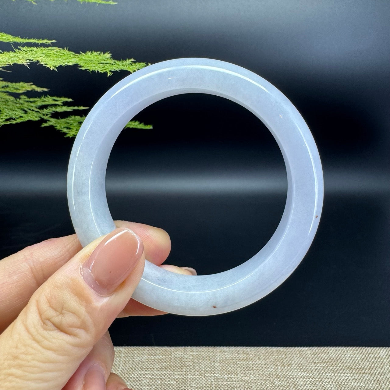 The bangle shape of the half round.The bangle color is icy lavender.
