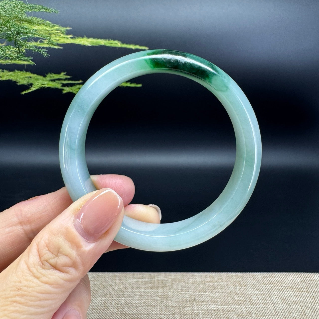 The bangle shape of the half round.The bangle color is oil green.
