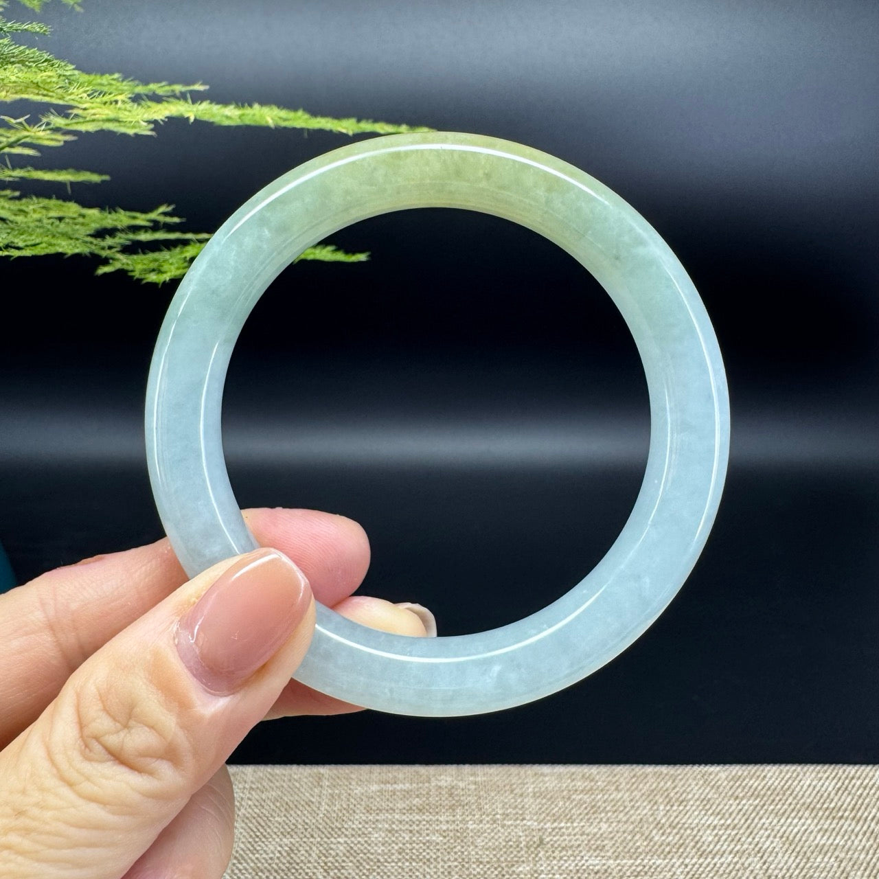 The bangle shape of the round.The bangle color is yellow green.