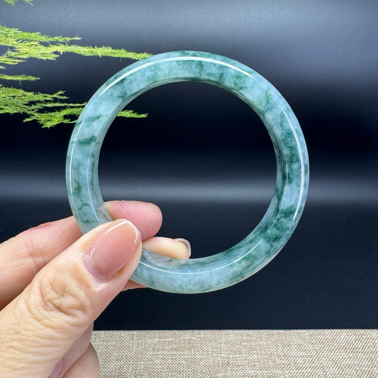 The bangle shape of the half round.The bangle color is oil green.