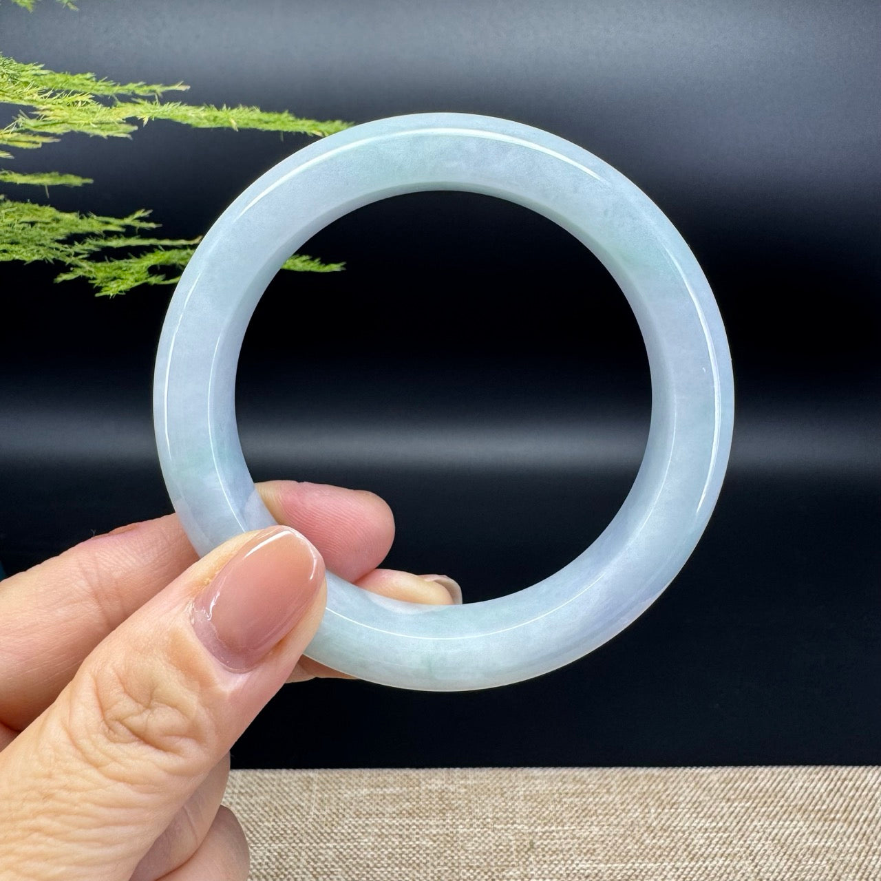 The bangle shape of the half round.The bangle color is icy lavender.