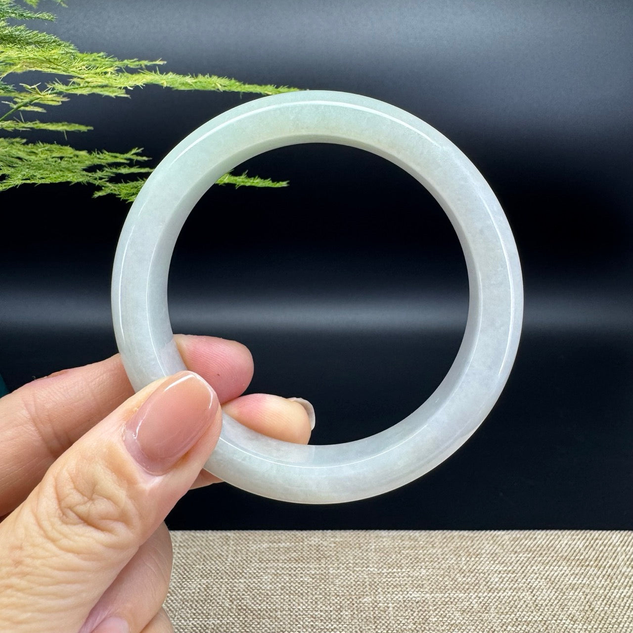The bangle shape of the half round.The bangle color is yellow green.