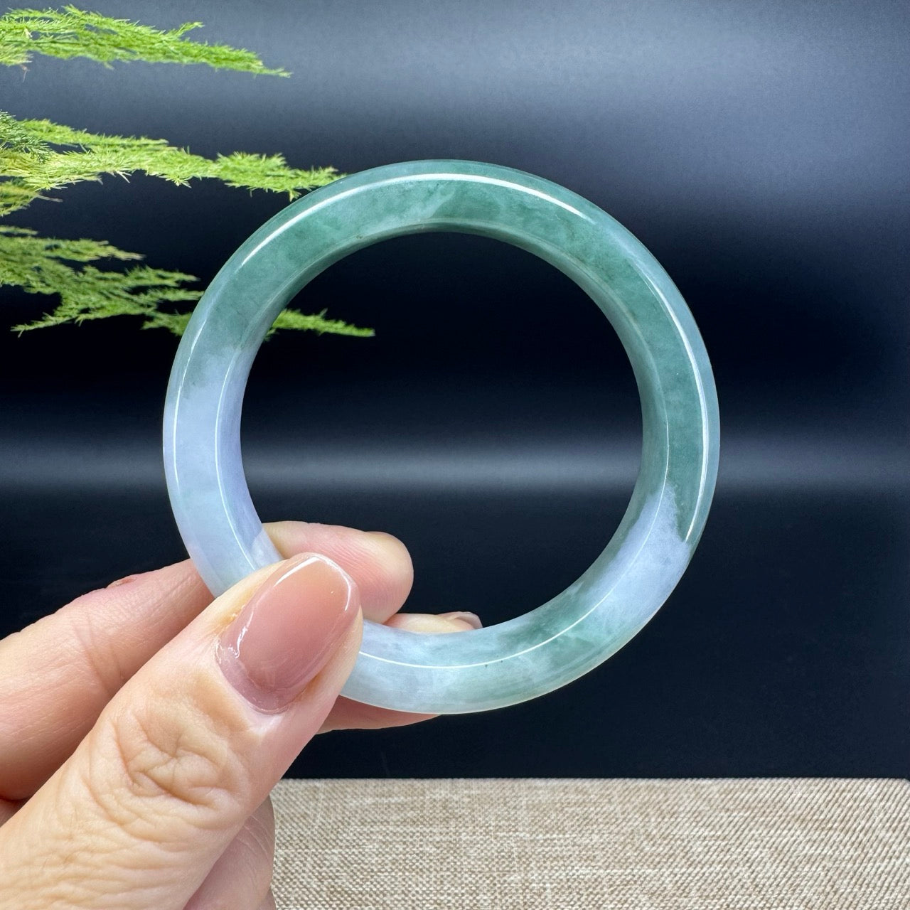 The bangle shape of the half round.The bangle color is lavender green.