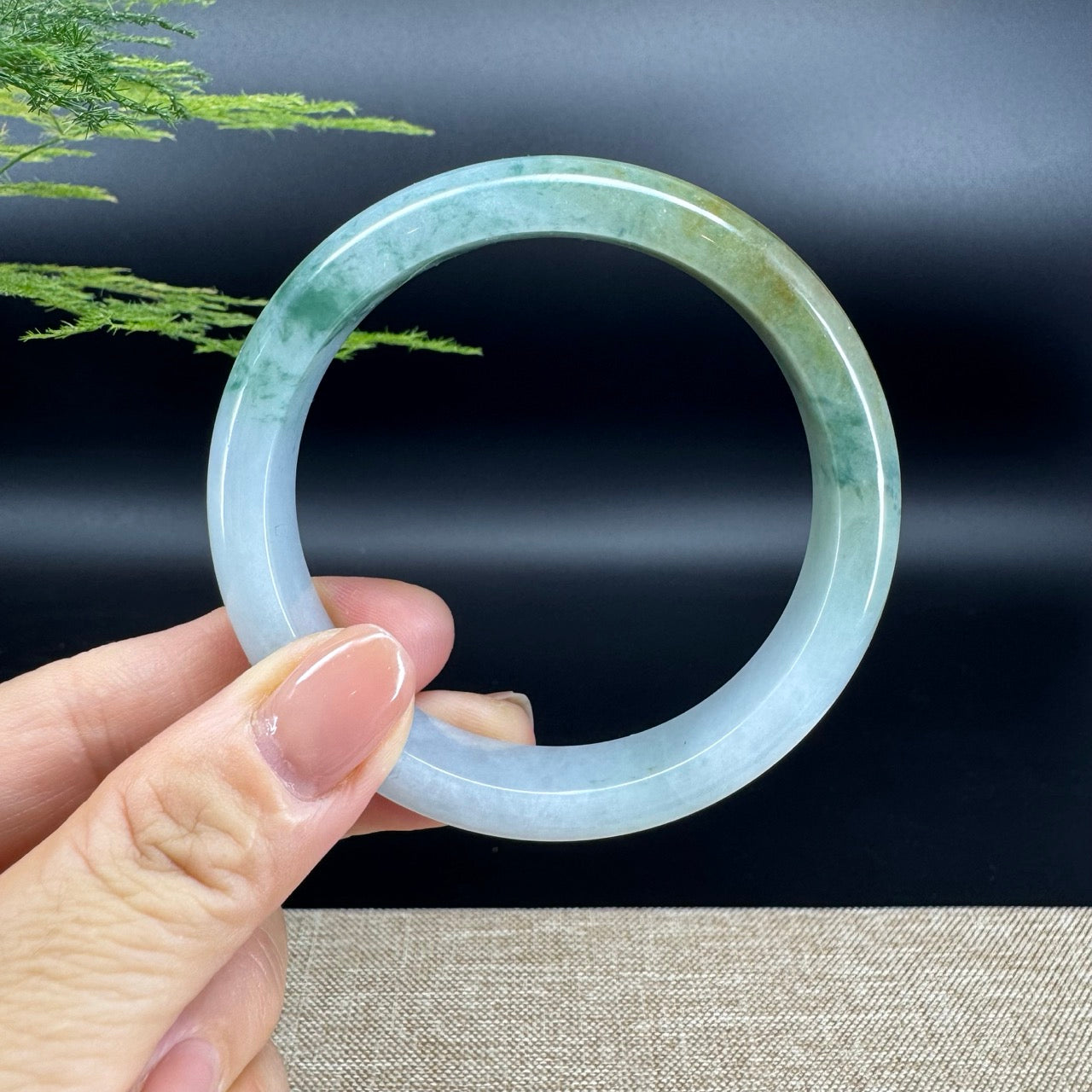The bangle shape of the half round.The bangle color is yellow green.