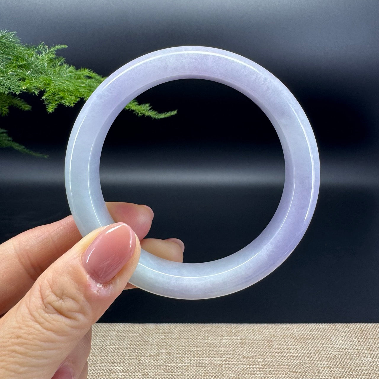 The bangle shape of the half round.The bangle color is lavender.