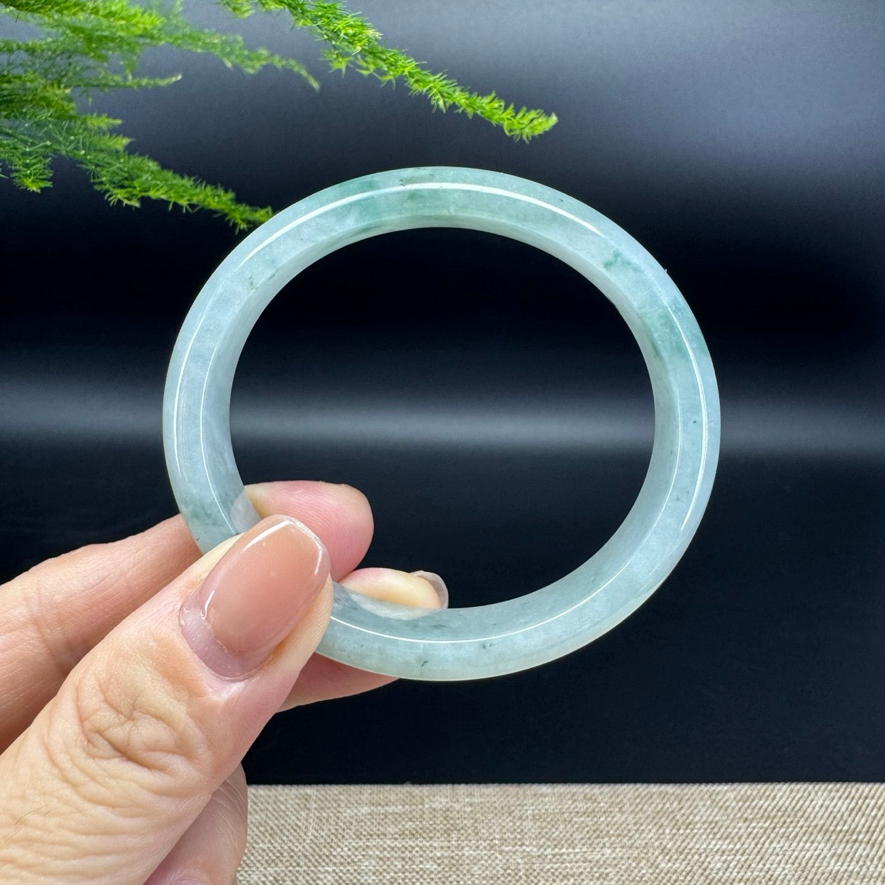 The bangle shape of the half round.The bangle color is icy blue flower.