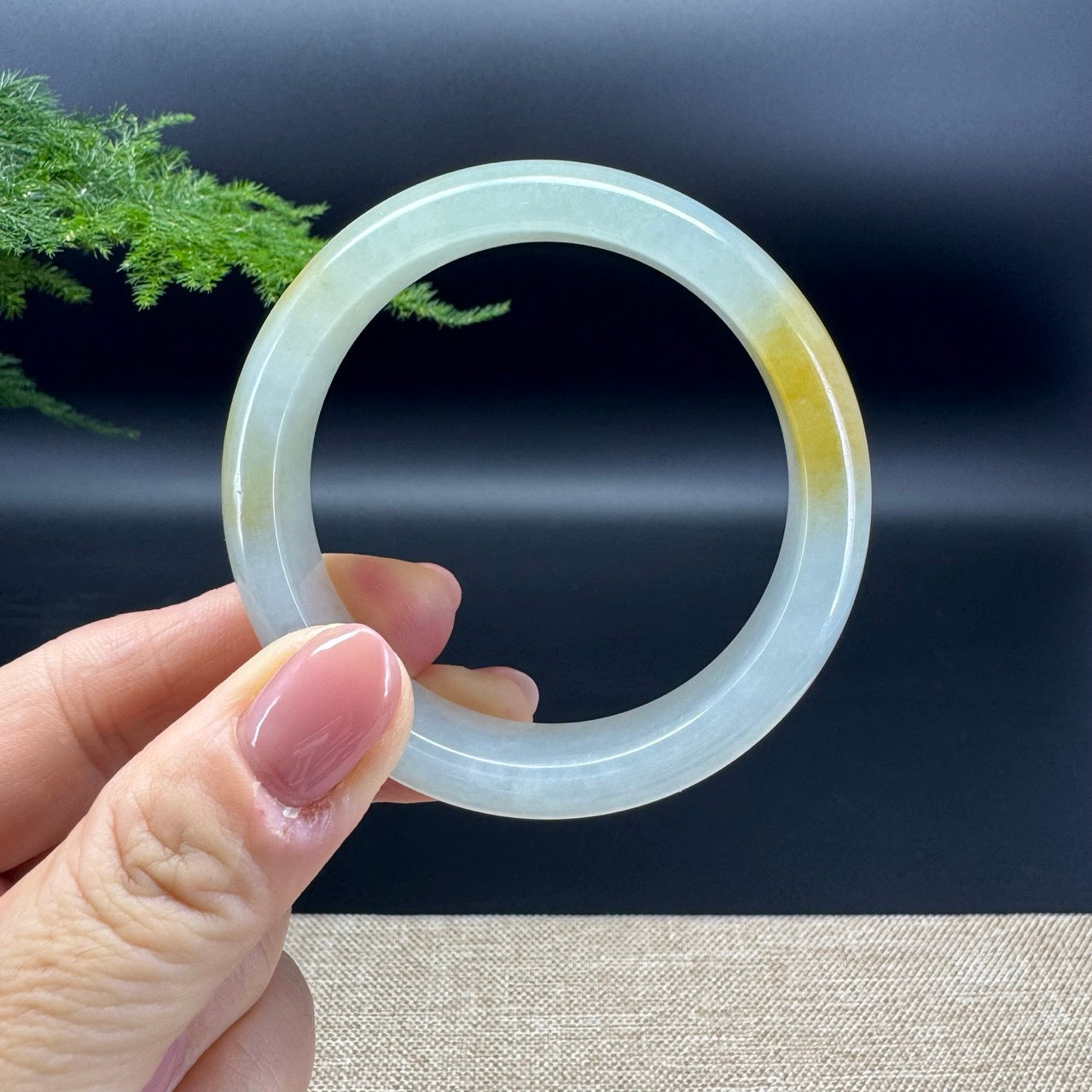The bangle shape of the half round.The bangle color is icy yellow.