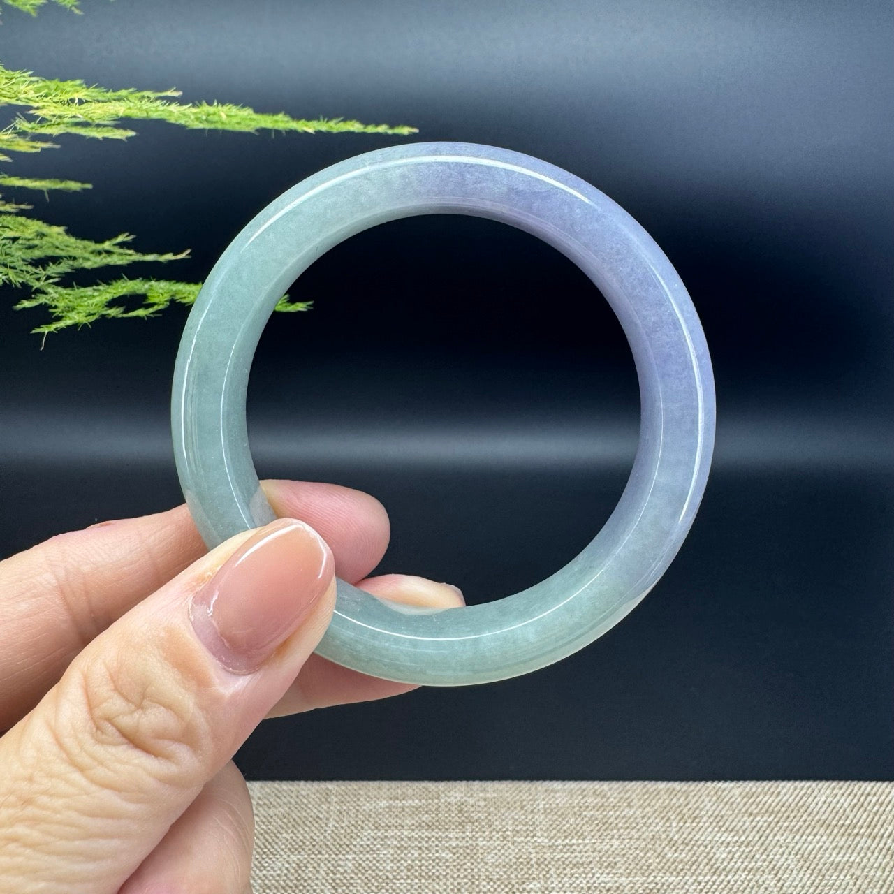 The bangle shape of the half round.The bangle color is lavender green.
