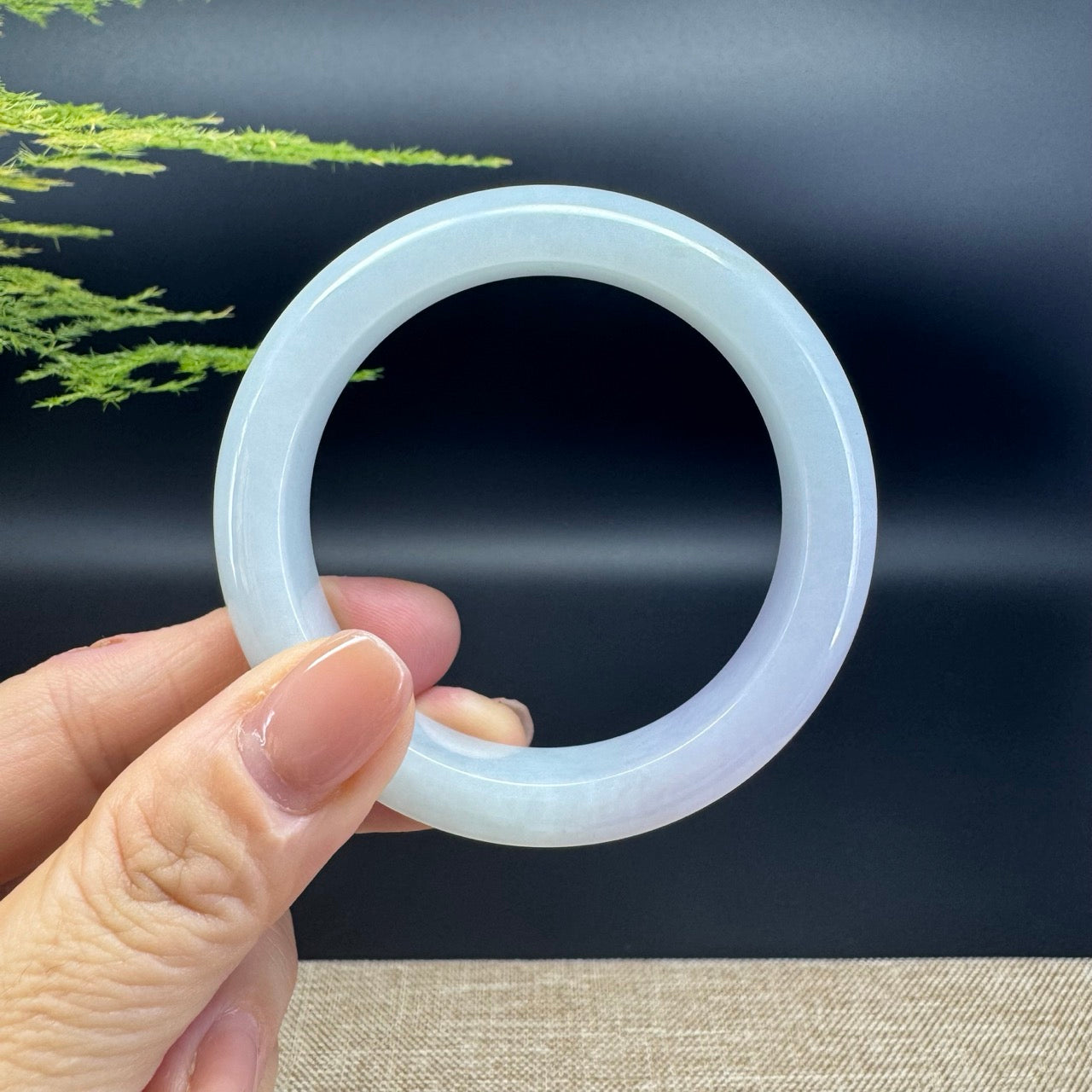 The bangle shape of the half round.The bangle color is icy lavender.