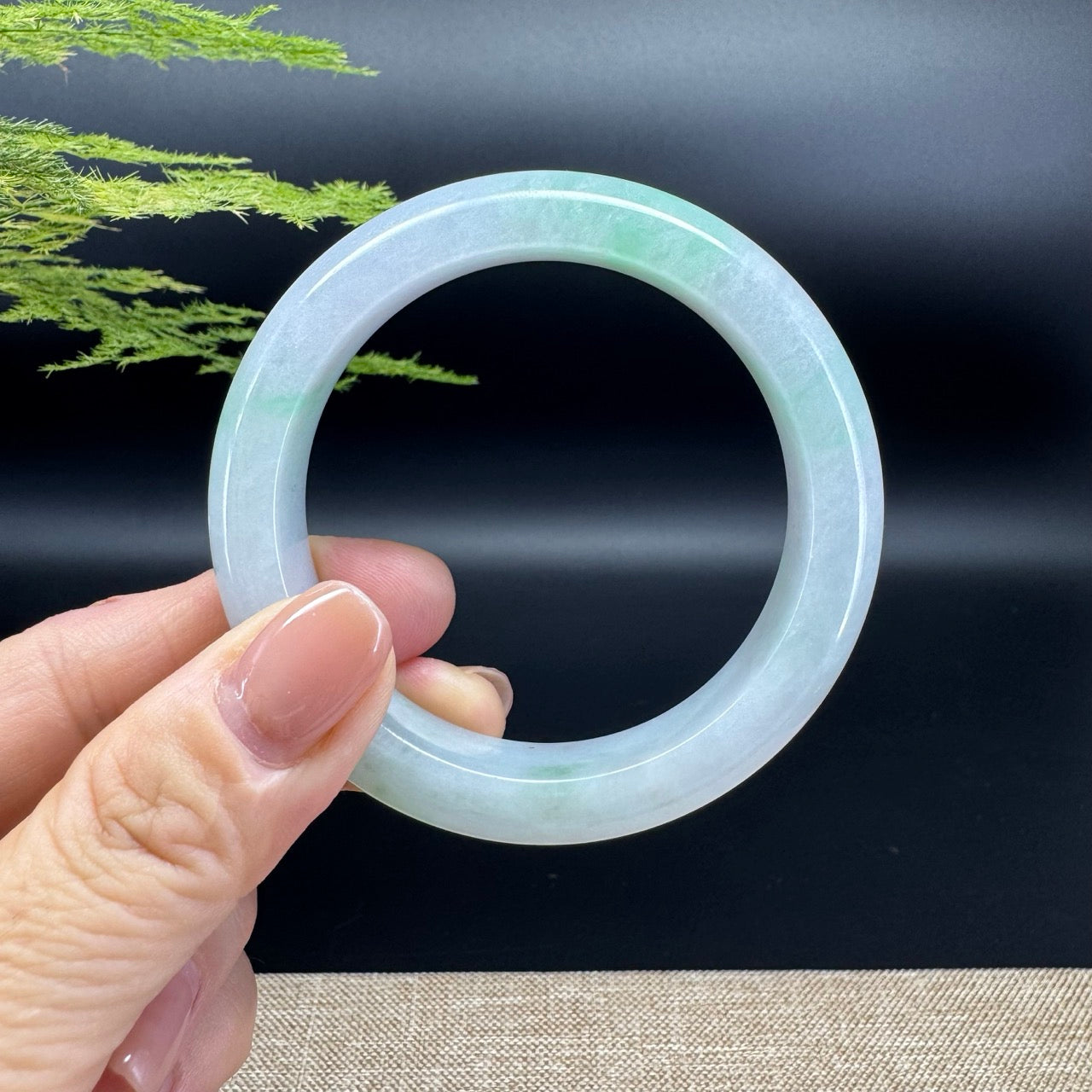 The bangle shape of the half round.The bangle color is lavender green.