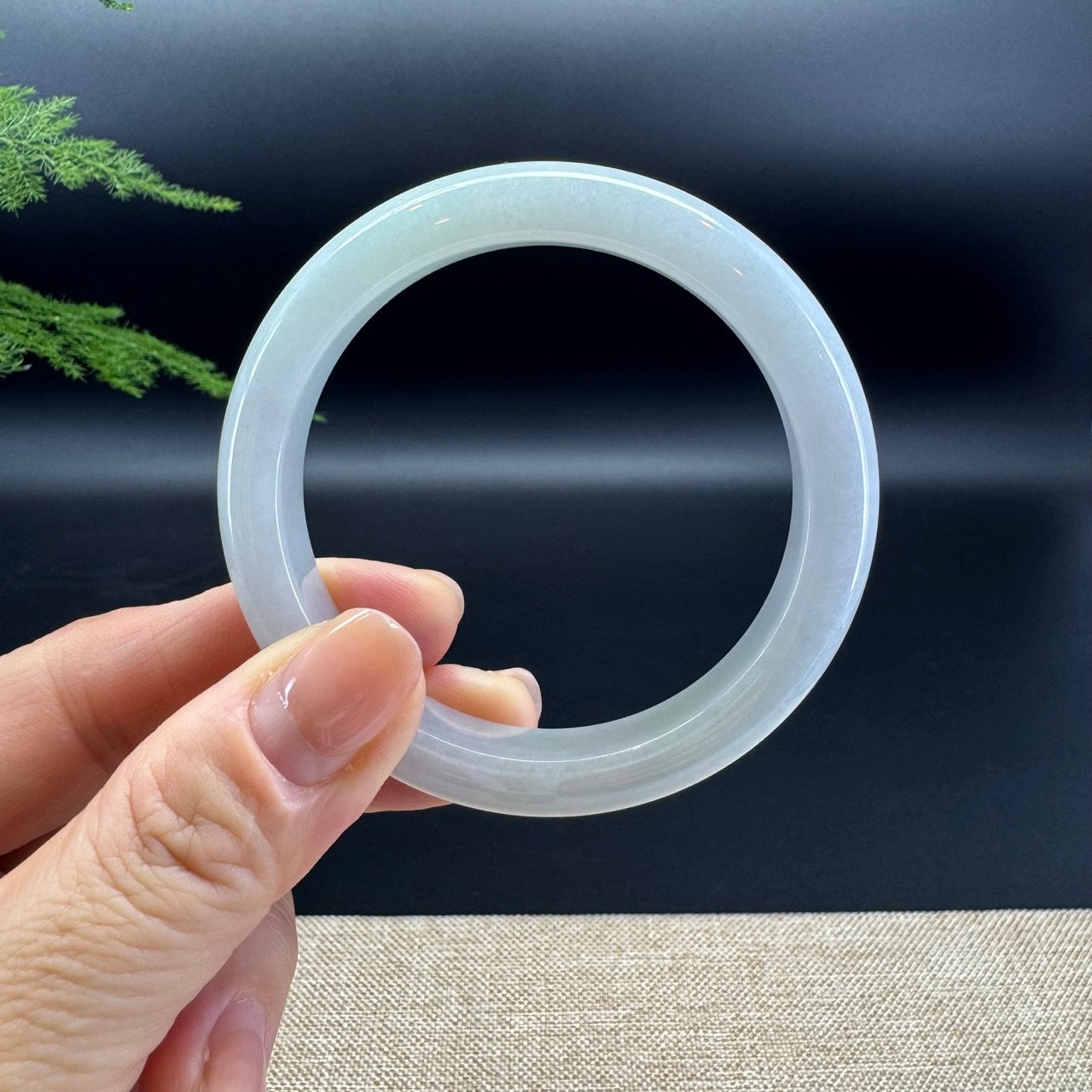 The bangle shape of the half round.The bangle color is lavender green.