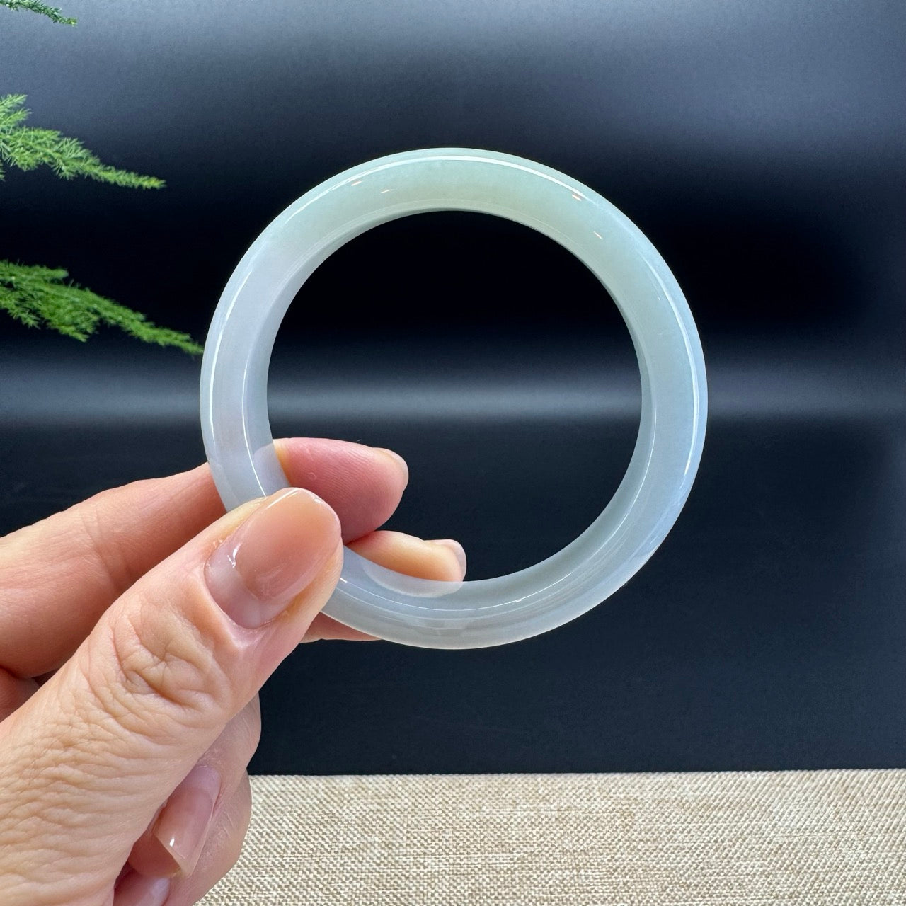 The bangle shape of the half round.The bangle color is lavender green