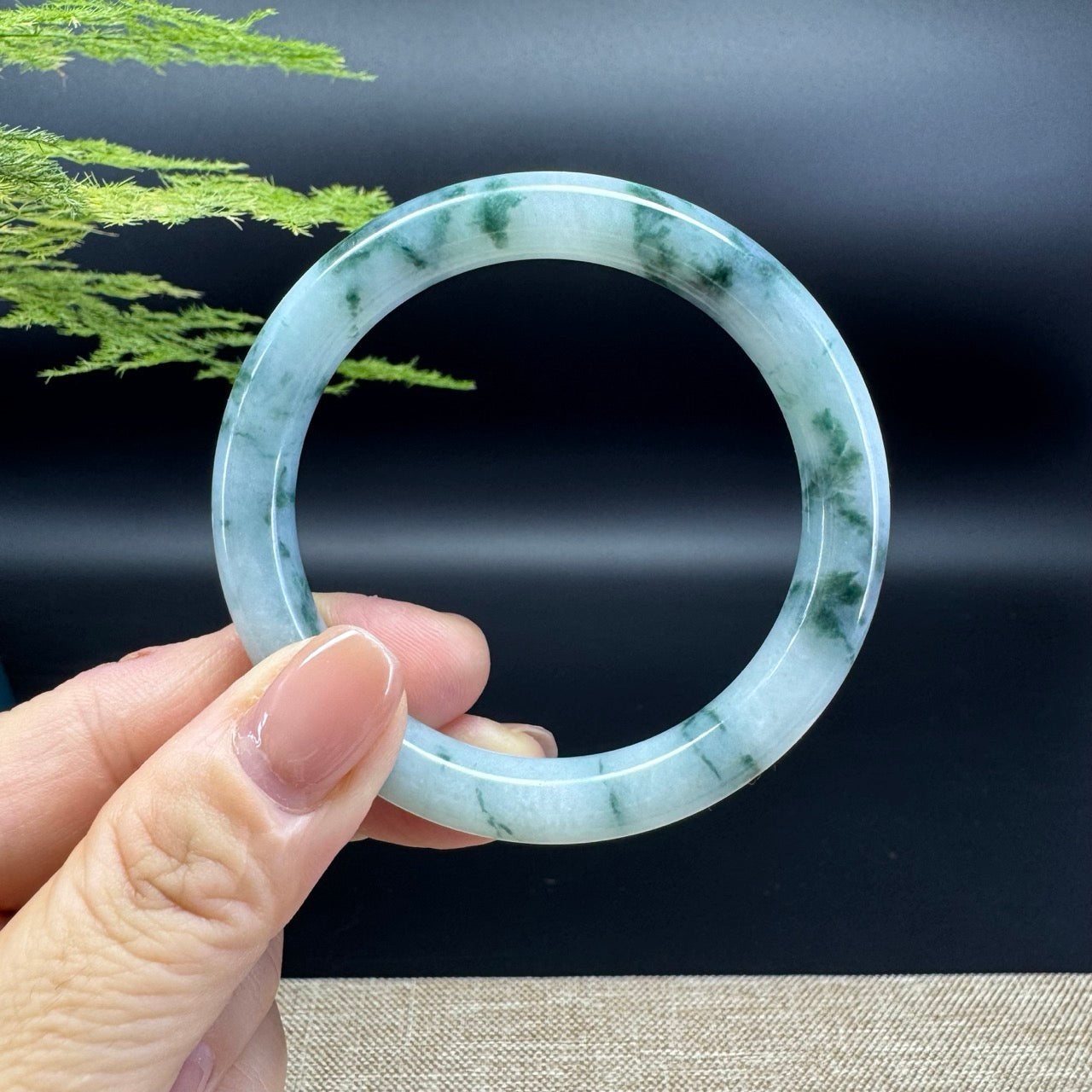 The bangle shape of the half round.The bangle color is icy blue flower.