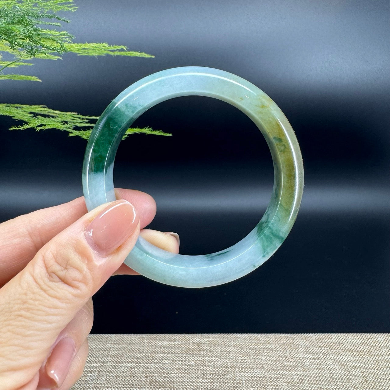 The bangle shape of the half round.The bangle color is yellow green.