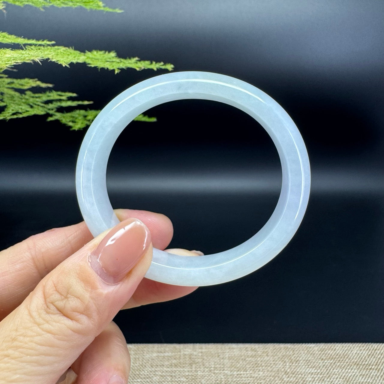 The bangle shape of the half round.The angle color is icy green.