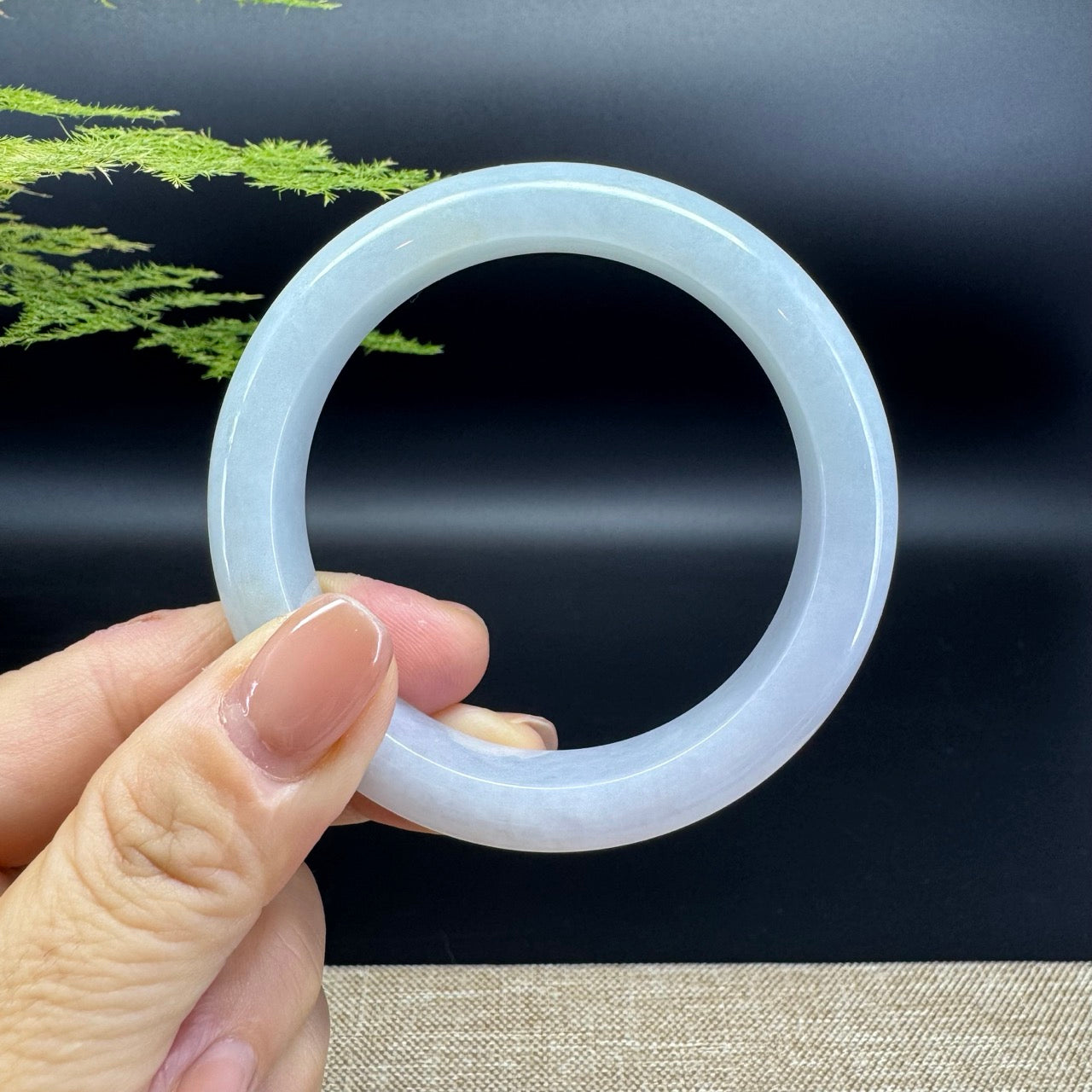 The bangle shape of the half round.The bangle color is lavender green.