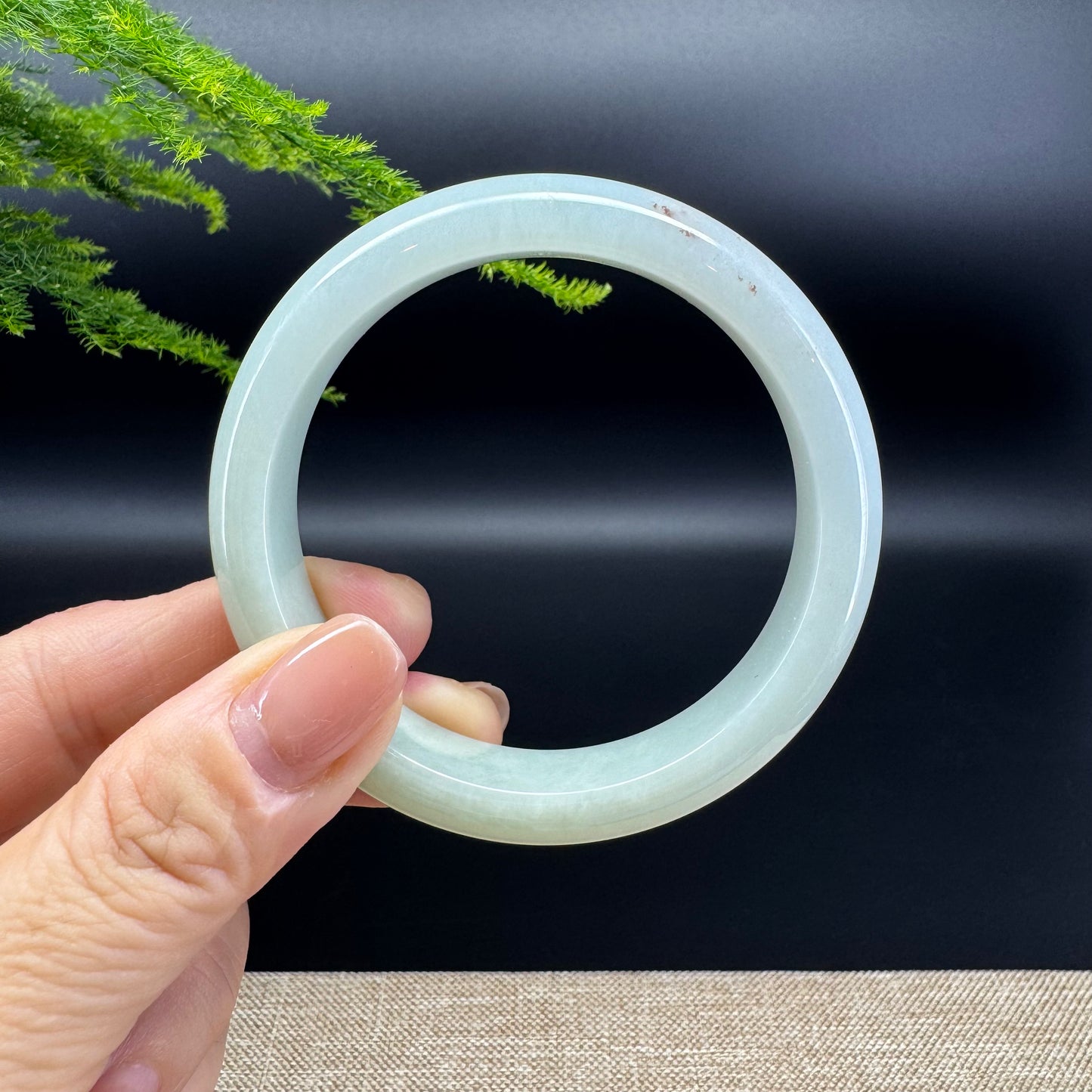 The bangle shape of he half round.The bangle color is light green.