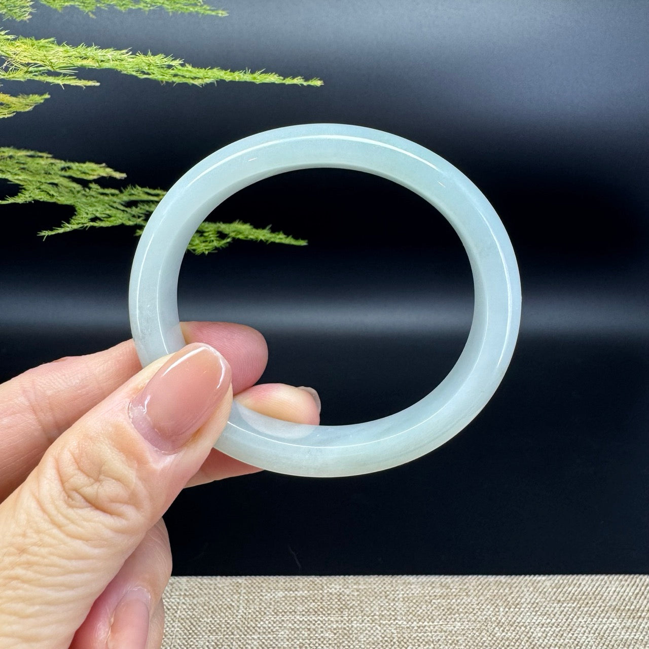 The bangle shape of the half round.The banle color is green.