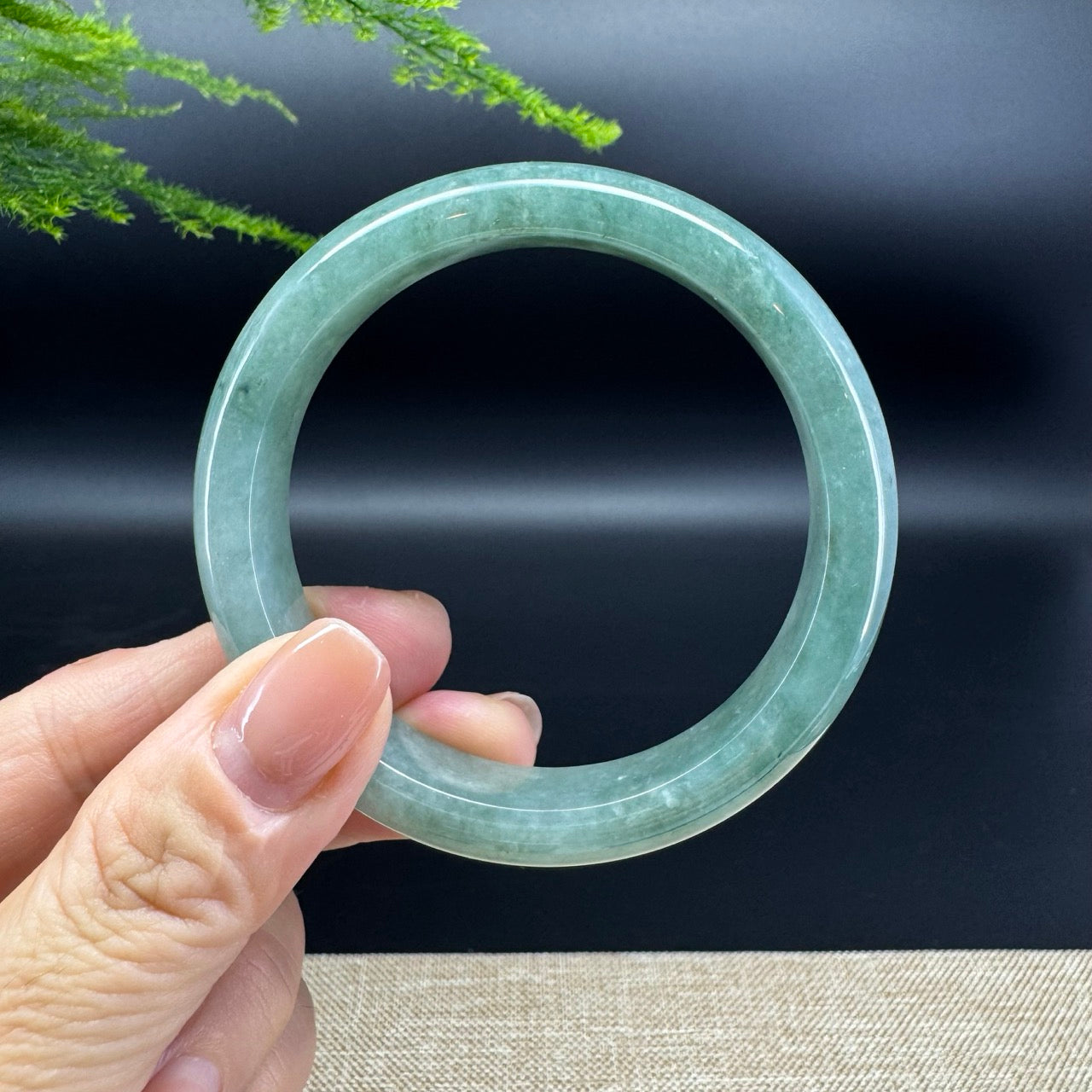 The bangle shape  of the half round.The bangle color is oil green.
