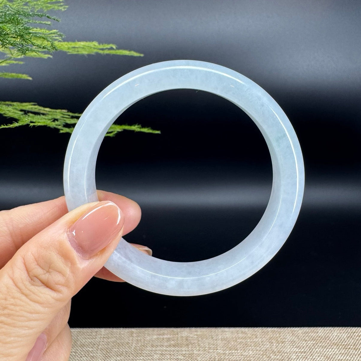 The bangle shape of the half round.The bangle color is icy lavender.