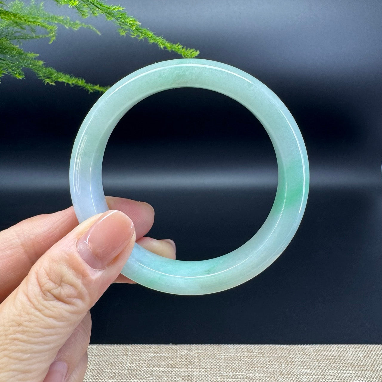 The bangle shape of the half round.The bangle color is lavender green.