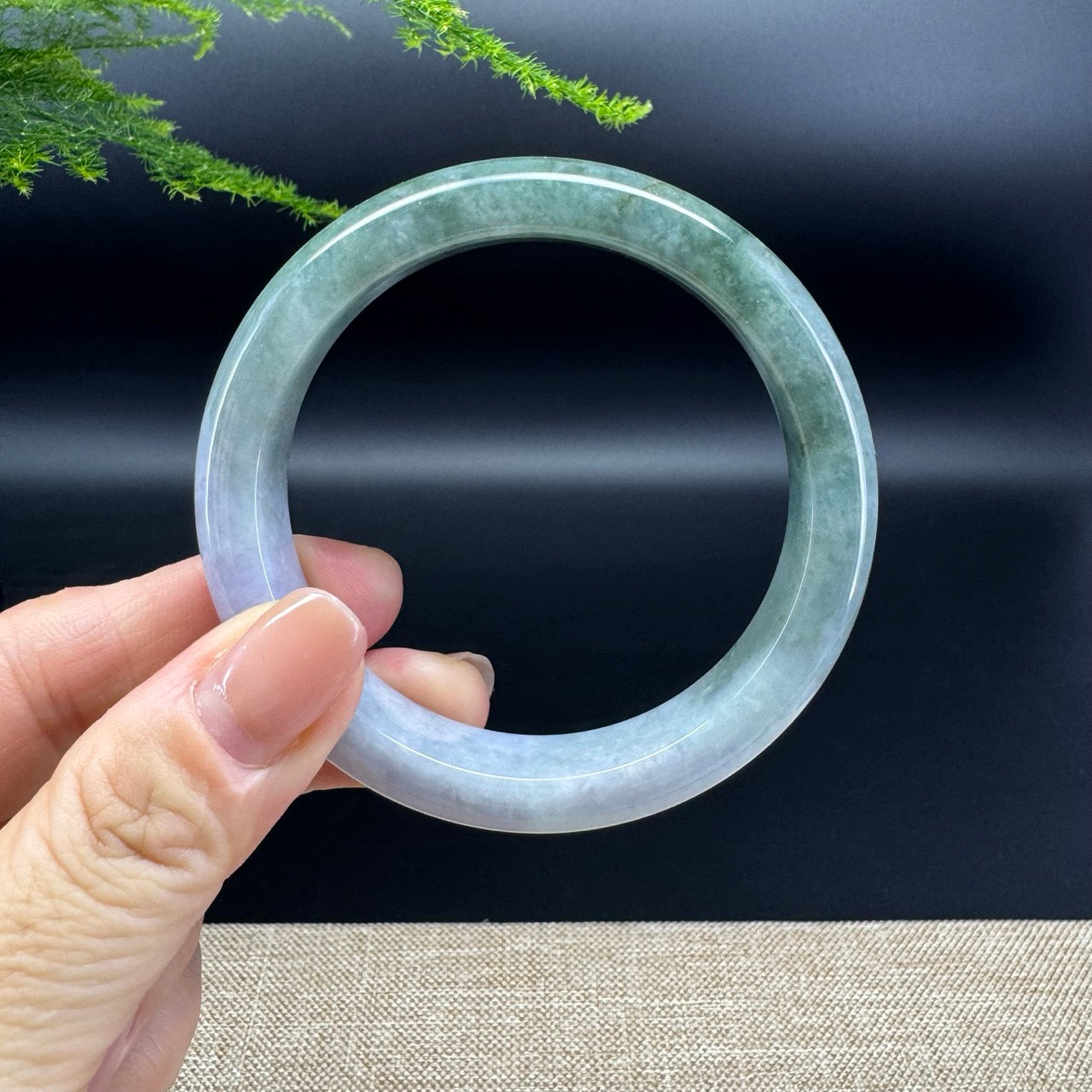 The bangle shape of the half round.The bangle color is lavender green.