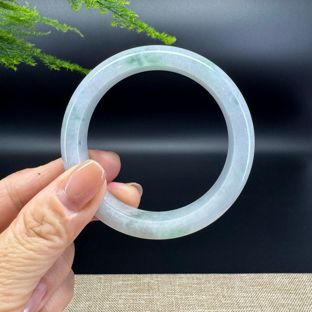 The bangle shape of the half round.The bangle color is lavender green.